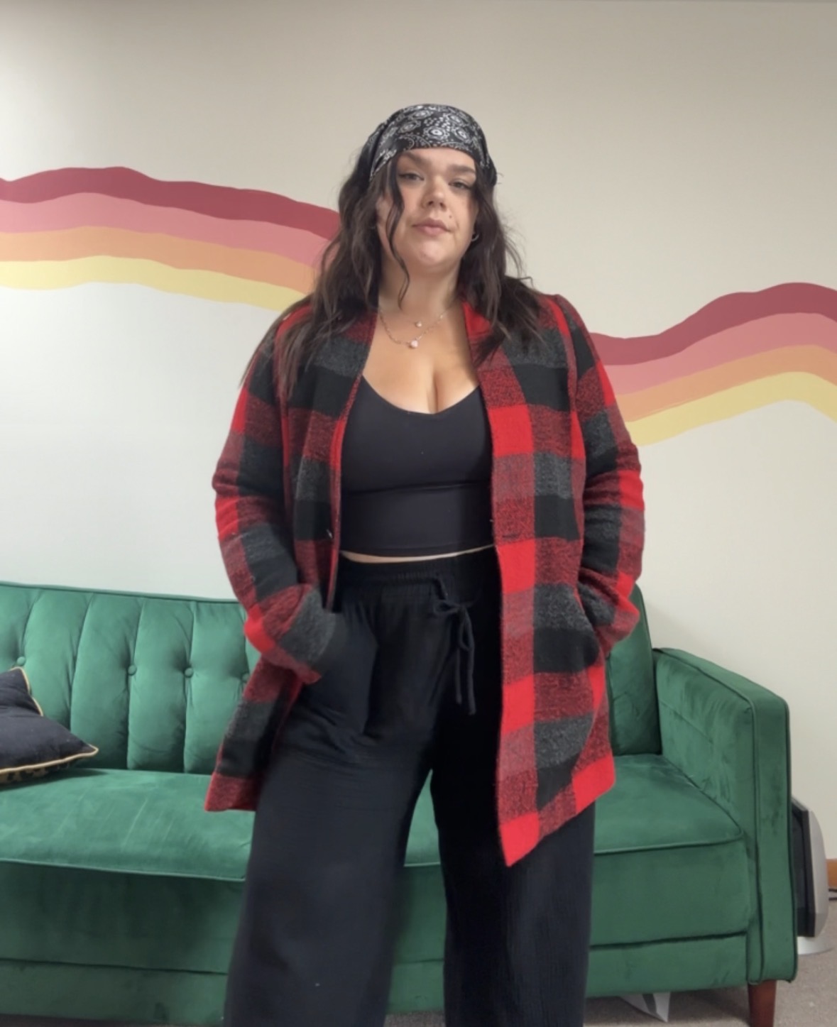 Brooklyn in a red plaid coat