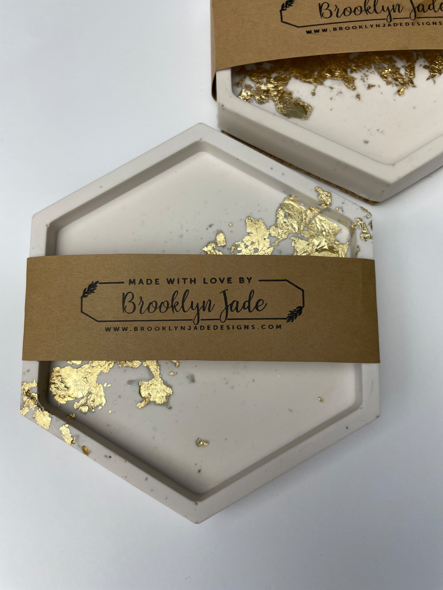 Two handmade trays wrapped in Brooklyn Jade packaging